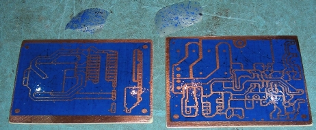 Removing excess resist from holes and between traces